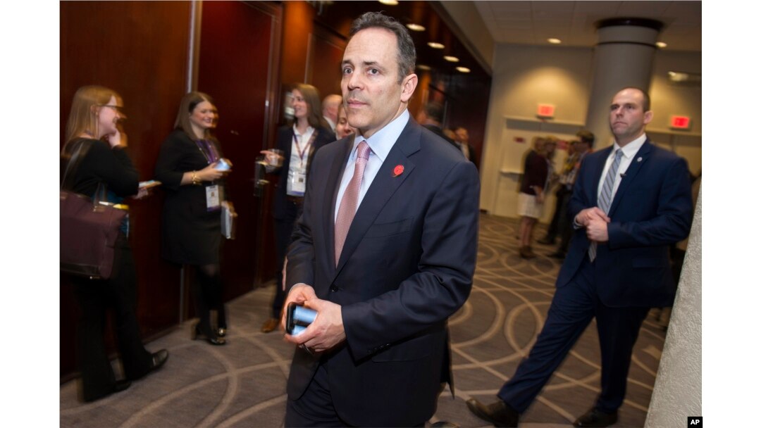 Kentucky Gov. Matt Bevin leaves a governors lunch during the National Governors Association Winter Meeting in Washington, Saturday, Feb. 25, 2017.