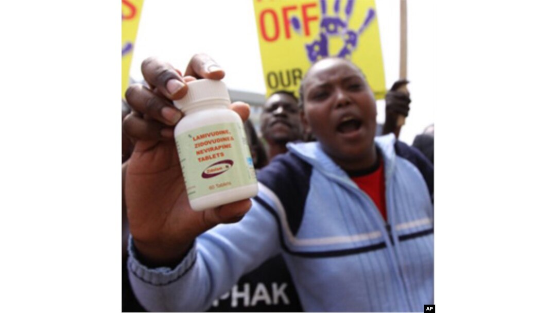 Demonstraters in Nairobi, Kenya on Thursday, Dec. 9, 2010, protest a potential free trade area agreement between the EU and India that could see cheap generic anti-AIDS drugs phased out. (AP Photo/Khalil Senosi)