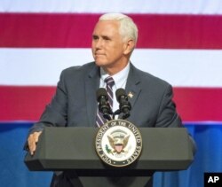 FILE - Vice President Mike Pence speaks at a campaign event for Republican U.S. Rep. Cathy McMorris Rodgers at the Spokane Convention Center in Spokane, Wash., Oct. 2, 2018.