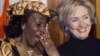 Nana Konadu Agyeman-Rawlings (L), wife of Ghana's President Jerry John Rawlings, speaks with first lady Hillary Rodham Clinton during an official state dinner at the White House, February 24, 1999. 
