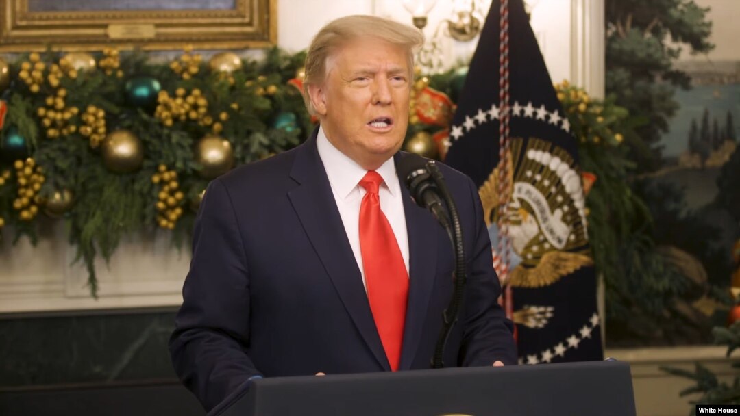 President Trump calls for more COVID-19 aid money for Americans in a video posted to Twitter Dec. 22, 2020.