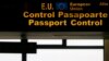 FILE - An EU sign is seen in the passport control area at Bucharest's Henri Coanda International Airport, Jan. 1, 2007. Many Turks are hoping a just concluded refugee deal with Brussels will eventually offer them visa-free travel in the EU.