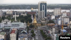 Sule pagoda seen among the building in Yangon city September 23, 2015. Arrangements have been underway to implement a new city project outside the commercial capital Yangon to cope with the speedy increasing population. However only three out of 54 compan
