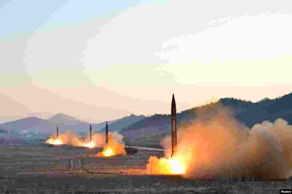 North Korea launches four ballistic rockets in this undated photo released by North Korea's Korean Central News Agency (KCNA) in Pyongyang.