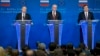 Russian President Vladimir Putin, left, European Council President Herman Van Rompuy, center, and European Commission President Jose Manuel Barroso attend a news conference at the European Commission headquarters in Brussels, Belgium, Jan. 28, 2014.