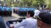 In this photo provided by the Presidential Photographers Division, Malacanang Palace, Philippine President Rodrigo Duterte speaks to erring policemen during an audience at the Presidential Palace grounds in Manila, Philippines, Feb. 9, 2017.