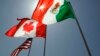 Lá cờ của Hoa Kỳ, Canada và Mexico, 3 quốc gia là đối tác trong một hiệp định thương mại Bắc Mỹ. Tổng thống Hoa Kỳ Donald Trump đã hoãn thuế 25% đối với hầu hết hàng hóa từ Canada và Mexico cho tới ngày 2/4/2025.