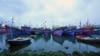 FILE - Fishing boats are docked in Tho Quang port, Danang, Vietnam, March 26, 2016. Fishermen from around the South China Sea tell stories of contending with bandits and coast guards.