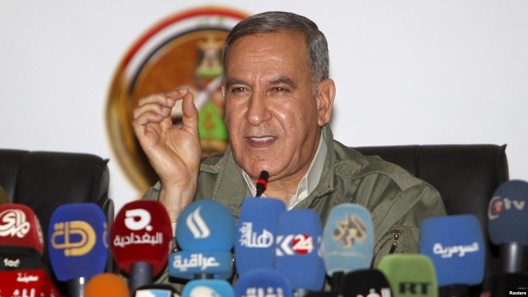 FILE - Khalid al-Obeidi, now ousted as Iraq's defense minister, speaks during a news conference in Baghdad, Dec. 19 2015.