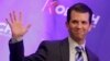 Donald Trump Jr. waves to the audience during a fundraiser for Kansas Secretary of State Kris Kobach's campaign for governor, Nov. 28, 2017.