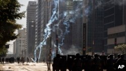 Police clash with anti-government demonstrators in Sao Paulo, Brazil, May 31, 2020.