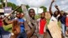 File photo shows residents chanting slogans as they protest in Kenya. Youth ministers recently met to discuss challenges: massive unemployment and the failure to involve young people in decision-making processes.