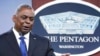 FILE - U.S. Defense Secretary Lloyd Austin speaks during a briefing at the Pentagon, outside Washington, May 6, 2021. 
