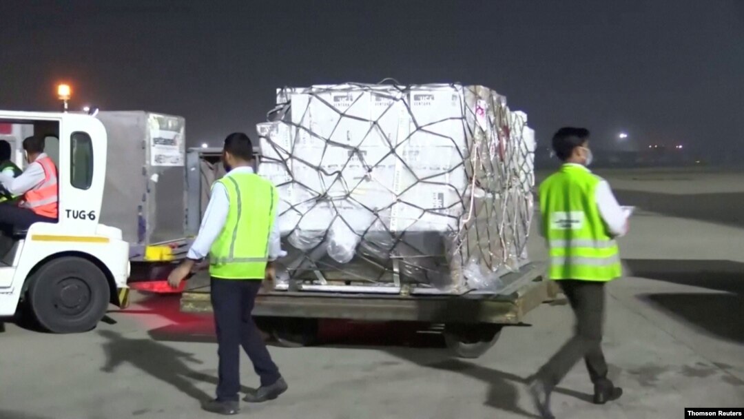 A shipment of vital medical supplies from the United Kingdom arrives in New Delhi, India, April 27, 2021.