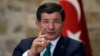 Turkish Prime Minister Ahmet Davutoglu speaks to a group of foreign reporters in Istanbul, Dec. 9, 2015. Turkey claims vindication for sending troops and tanks into Iraq, following an attack on a Turkish base training Iraqis who are fighting Islamic State.
