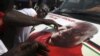 National Democratic Congress (NDC) party supporters celebrate the victory of their candidate, John Dramani Mahama, in Accra, December 9, 2012.