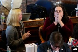 Rep. Aime Wichtendahl, a Democrat from Hiawatha, reacts after speaking during debate on a gender identity bill, Feb. 27, 2025, at the Statehouse in Des Moines, Iowa.