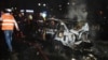 FILE - Members of emergency services work at the scene of an explosion in Ankara, Turkey, March 13, 2016.