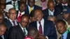Kenya's President-Elect Uhuru Kenyatta arrives at the the National Election Center where final election results were announced declaring he would be the country's next president, in Nairobi,March 9, 2013. 