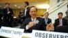 FILE - Taiwan's health minister Ching-Chuan Yeh shows his badge at the World Health Assembly in Geneva, Switzerland, May 18, 2009.