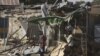 Police say Boko Haram militants staged attack in Kano, Nigeria Jan 24, 2011 which left this market in ruins and left at lead 185 people dead
