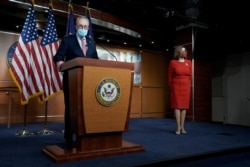 Senate Minority Leader Charles Schumer (D-NY) speaks to reporters on an agreement of a COVID-19 aid package with Speaker of the House Nancy Pelosi (D-CA) on Capitol Hill Washington, D.C., Dec. 20, 2020.