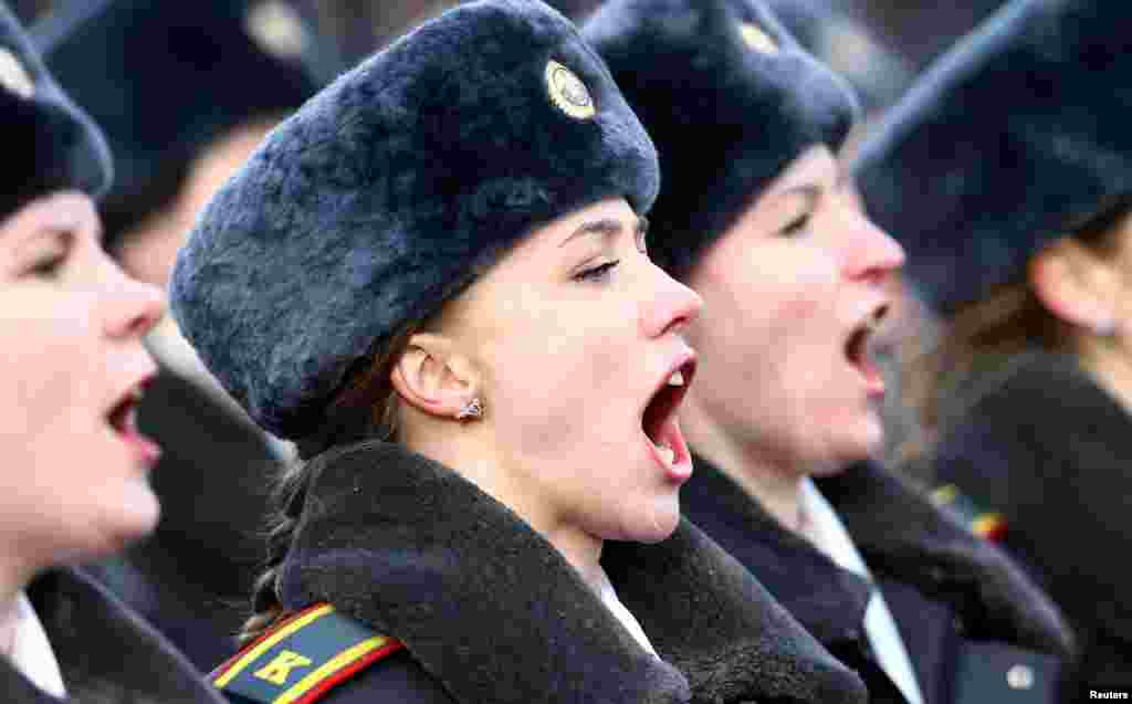 Policewomen march during a parade to mark the 100th anniversary of the Belarussian Police in Minsk, Belarus, March 4, 2017.