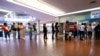 Voters wait in line at a polling place located inside a shopping mall in Austin, Texas. 