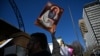 FILE - Pro-life and pro-choice advocates hold a protest rally outside the New South Wales Parliament in Sydney on Aug. 6, 2019.