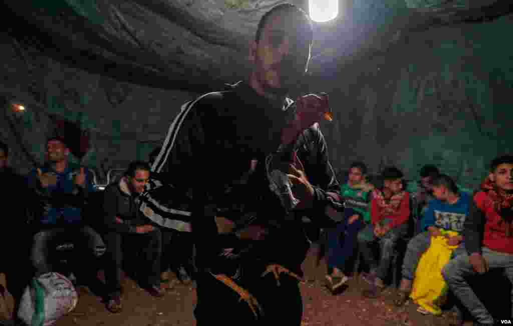 Ahmed Gamal, 28, owner of the winning Indian rooster named Max, says, &quot;I am glad he did not lose an eye, I will put him for more fighting matches but not tonight.&quot; (H. Elrasam/VOA) 