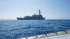 FILE - Arleigh Burke-class guided-missile destroyer USS Dewey transits the South China Sea.