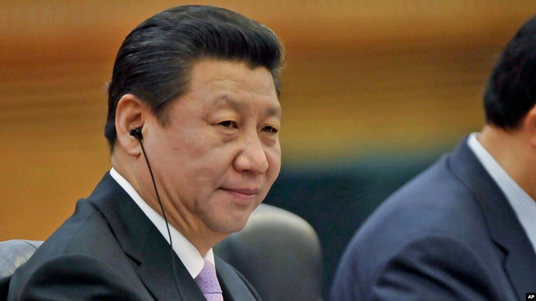 FILE - Chinese President Xi Jinping attends a meeting at the Great Hall of the People in Beijing.
