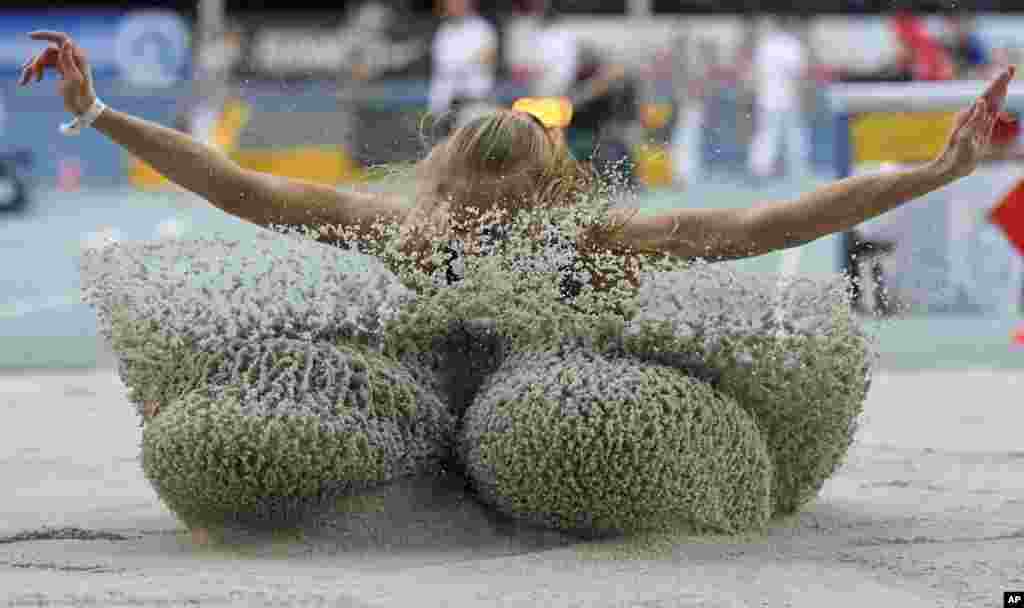 Luisa Bodem competes during the women's long jump event at the German indoor athletics in Leipzig, Germany.