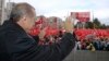 Turkish President Recep Tayyip Erdogan salutes the crowd of supporters in his hometown of Rize, on the Black Sea coast of Turkey, Oct. 15, 2016. Erdogan said Turkey was moving into Dabiq, Syria, and would declare a "terror-free safe zone" in the region.