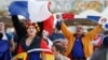 Fans watch French and German soccer teams’ quarterfinal match in the border town of Kehyl, Germany, near Strasbourg, July 4, 2014.