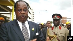 Malawi's Ex-President Bakili Muluzi and father of Atupele Muluzi who has resigned as minister.