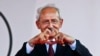 Kemal Kilicdaroglu, leader of Turkey's main opposition Republican People's Party (CHP) makes a heart shape with his hands after delivering a speech at a rally in Istanbul, Turkey, June 2, 2015.