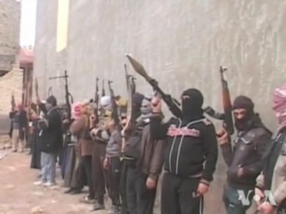 US Cautiously Helps Iraq Fight Militants