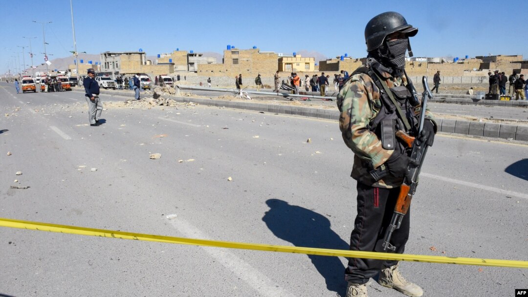 Security personnel inspect the site of a bomb blast in Quetta, Pakistan, on Feb. 1, 2024. On Feb. 2 in Mach, about 65 kilometers (40 miles) southeast of Quetta, government security forces killed 24 separatist militants in a counterinsurgency operation.