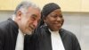 Newly sworn-in ICC prosecutor Fatou Bensouda shares a laugh with her predecessor Luis Moreno-Ocampo (L) at the ICC, The Hague, Netherlands, June 15, 2012. 