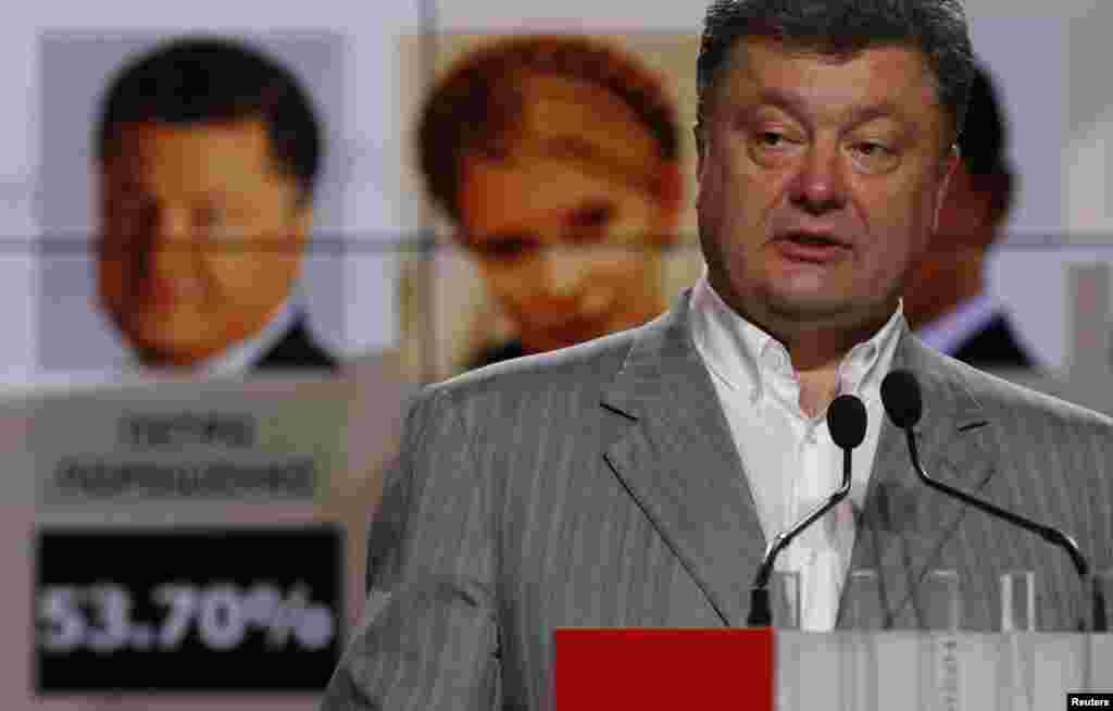 Ukrainian businessman, politician and presidential candidate Petro Poroshenko speaks during a news conference in Kyiv, May 26, 2014. 
