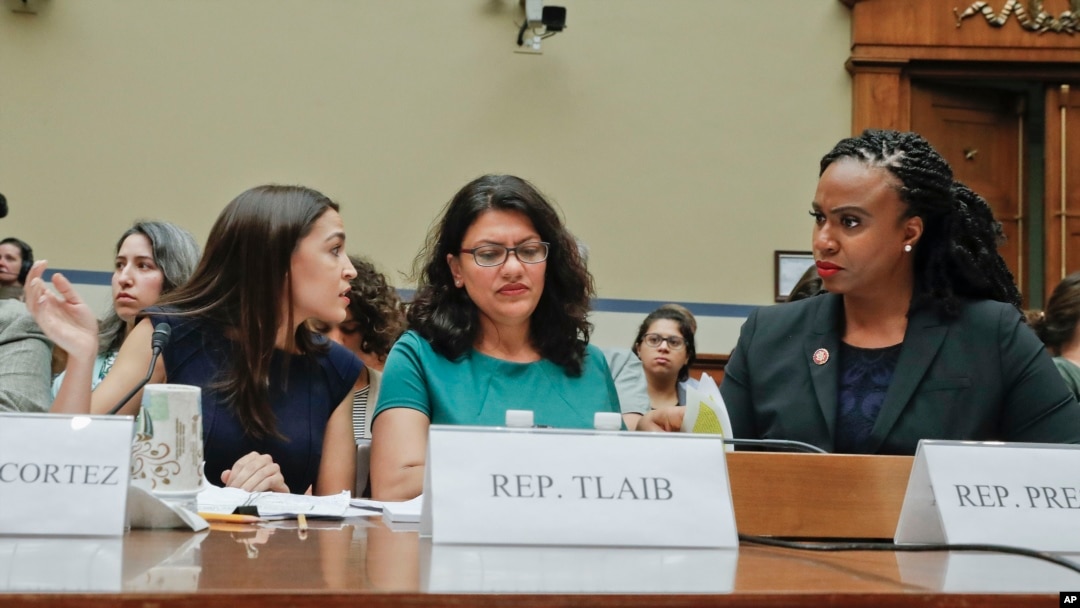 FILE - From l-r., Rep. Alexandria Ocasio-Cortez, D-NY., Rep. Rashida Tlaib, D-Mich., and Rep. Ayanna Pressley, D-Mass., wait to testify before the House Oversight Committee hearing on family separation and detention centers, July 12, 2019. 