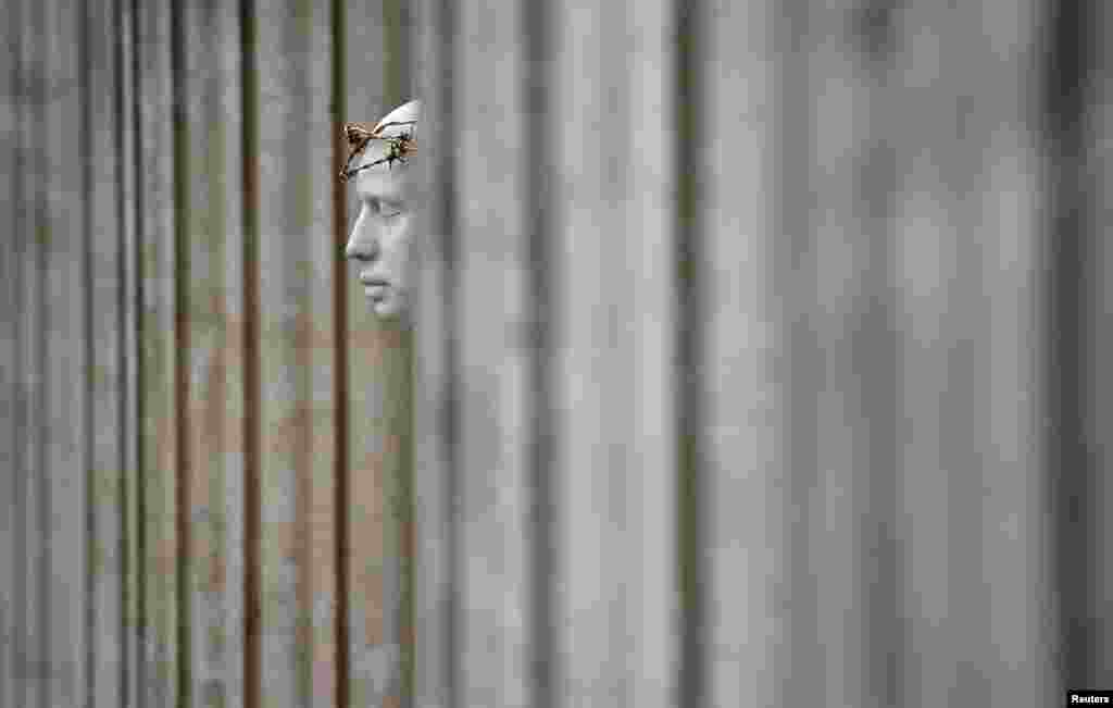 The 'Ecce Homo' statue by artist British Mark Wallinger stands outside St Paul's Cathedral in London, Britain.