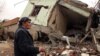 A resident walks on the rubble of a destroyed house in the mostly-Kurdish town of Silopi, Turkey, Jan. 19, 2016. Turkey's president has ruled out any further peace efforts with Kurdish rebels.