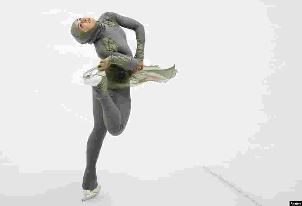 Zahra Lari of United Arab Emirates performs during women's short program of Figure Skating competition at Makomanai Indoor Skating Rink at the Asian Winter Games in Sapporo, northern Japan.