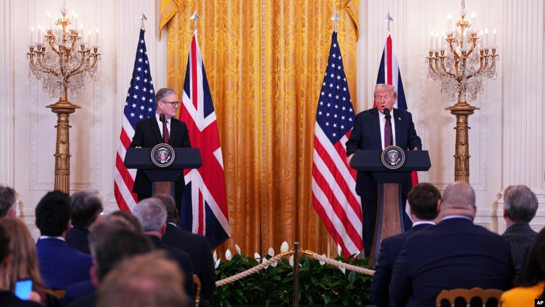 Britain's Prime Minister Keir Starmer, left, and U.S. President Donald Trump speak during a joint press conference in the East Room at the White House, Feb. 27, 2025, in Washington. 