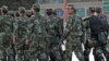 Armed police officers patrol an ethnice Uighur area in Kashgar, in Xinjiang province Aug. 4, 2011.