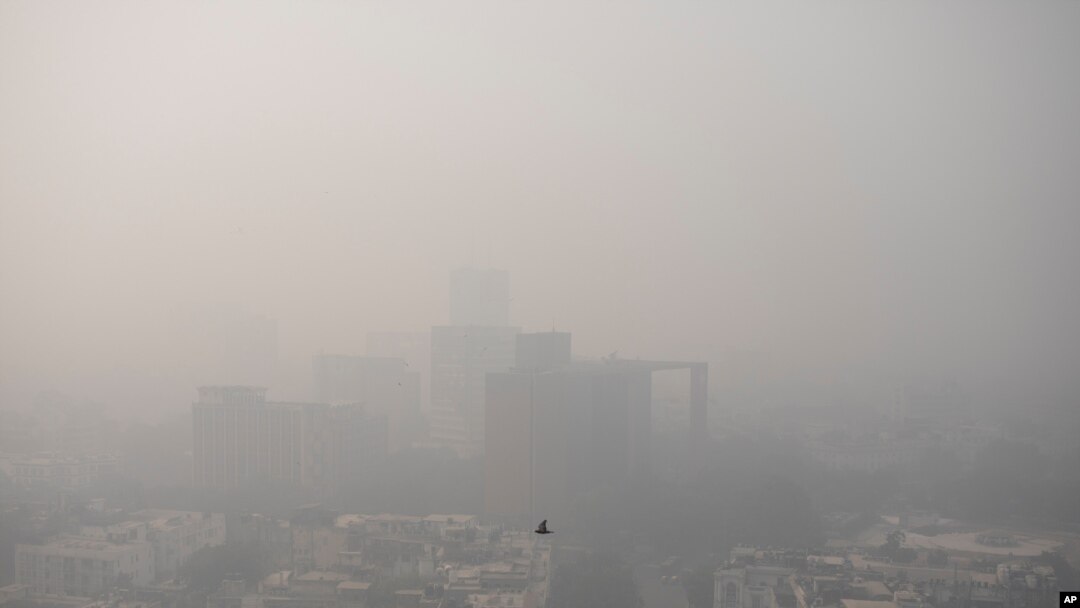 Smog envelopes the skyline in New Delhi, India, Nov. 4, 2020.