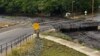 Fotografía proporcionada por la Guardia Nacional de Nuevo México, el agua de la inundación fluye sobre un puente el sábado 29 de junio de 2024 en Ruidoso, Nuevo México. 