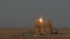 In this Tuesday, July 3, 2012 file photo released by the Iranian Fars News Agency, a surface-to-surface missile is launched during an Iranian Revolutionary Guard maneuver in an undisclosed location in Iran.
